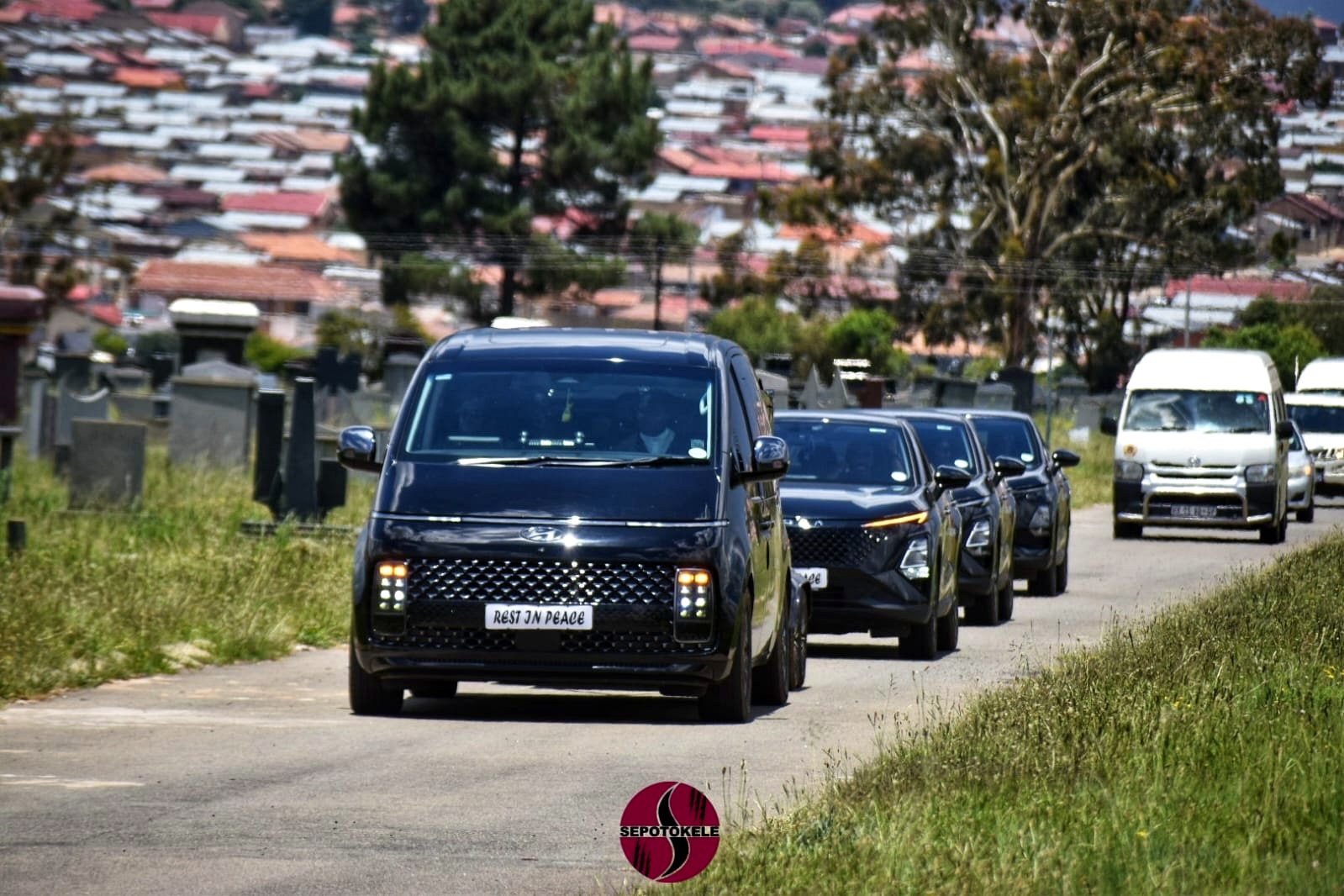 Sepotokele Hyundai Staria vehicles on a cemetery access road