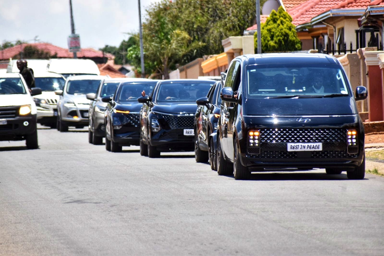 Sepotokele Hyundai Staria fleet with Rest in Peace plates driving through a township