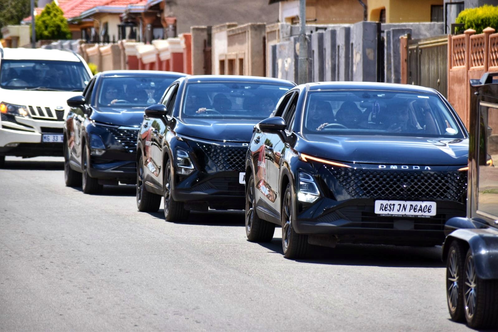 Sepotokele SUV family transport fleet moving through a township street